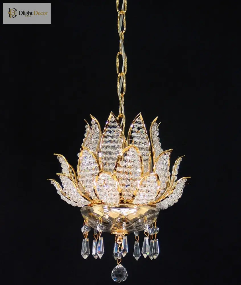 Gold crystal chandelier with lotus centerpiece and dangling clear crystal ornaments