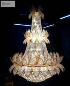 Gold and clear crystal chandelier with tiered lotus design, faceted petals