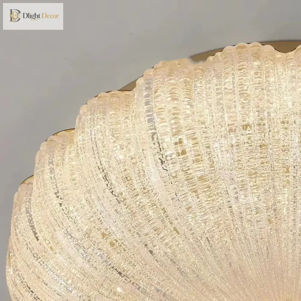 Close-up of crystal-style acrylic scalloped diffuser for an LED flush-mount ceiling light