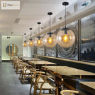 Modern Glass Orb Pendant: Stylish Lighting For Restaurants