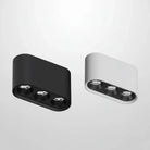 Linear surface-mounted LED ceiling spotlight, black and white housings with three spots
