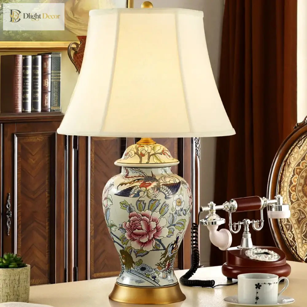 Neoclassical LED desk lamp with ivory shade and floral ceramic base with gold trim