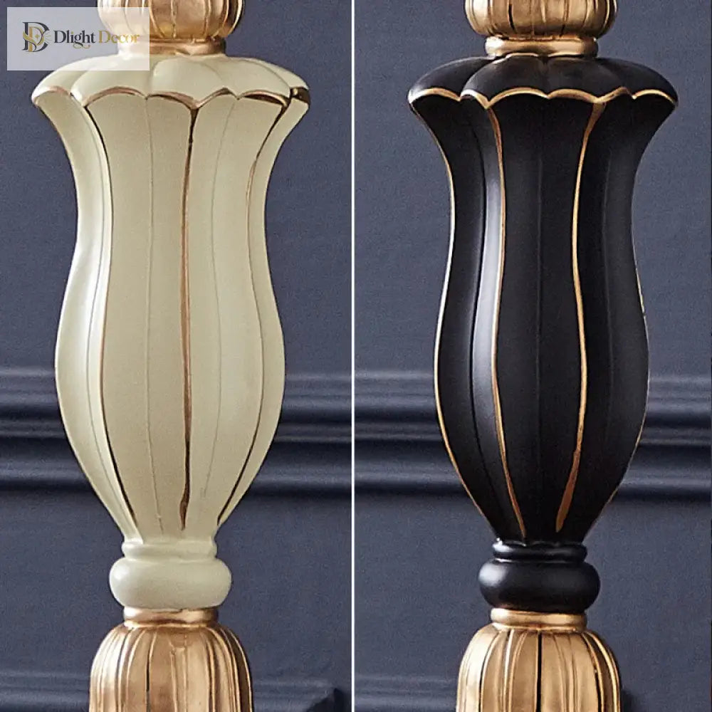 Resin lamp base close-up in cream or black with gold decorative accents.