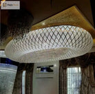 Oval crystal chandelier with white mesh frame and vertical hanging bead strands
