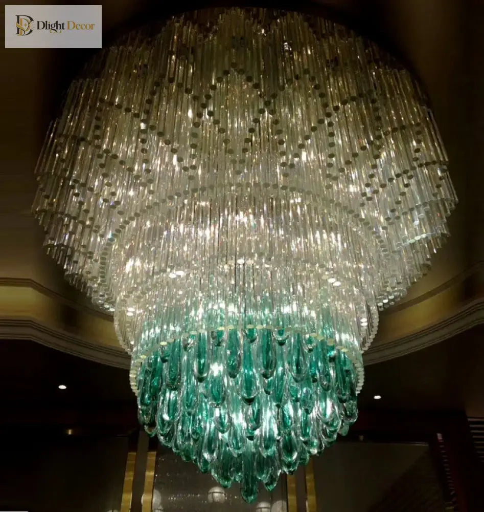 Brass-gold and teal oval crystal chandelier with long hanging bead curtains