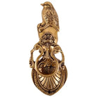Victorian cast brass owl door knocker angled side view with beak up and circular ring handle