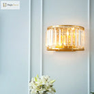 Payton Elegance Meets Prismatic Brilliance: The Gold Wall Lamp With Crystal Shade