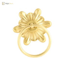 Gold-tone floral ring pull door knocker, close-up with round hoop ring