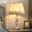Retro crystal desk lamp with pleated white shade and decorative silver base