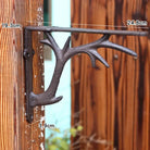 Retro iron triangle shelf bracket with size markings, dark metal, wall-mounted corner support