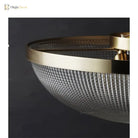 Flush-mount ceiling light side view: clear faceted glass bowl with gold rim