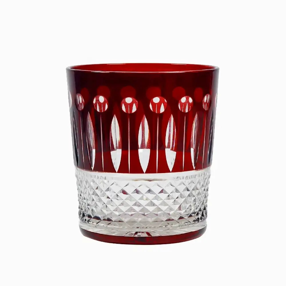 Red and clear diamond-cut crystal whiskey tumbler with faceted silver-toned middle band