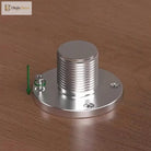 Round metal mounting base for an adjustable furniture leg with exposed threads