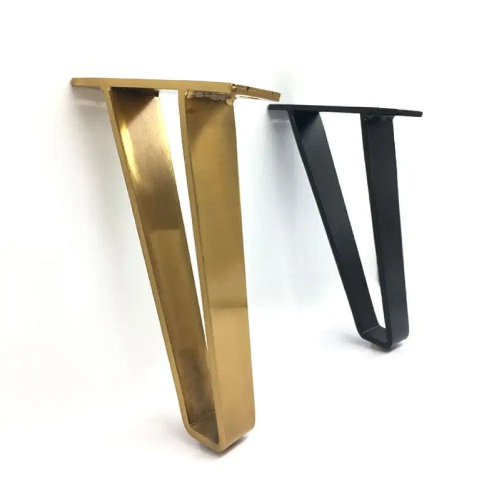 Set of U-shaped metal furniture legs in gold and black, side-by-side pair