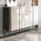 Set of 2 furniture legs with gold accents and black posts under a cabinet