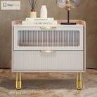 Gold cabinet furniture legs with square mounting plates under a cabinet