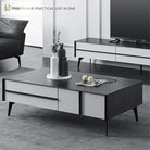 Black metal furniture legs installed under a coffee table with adjustable pads