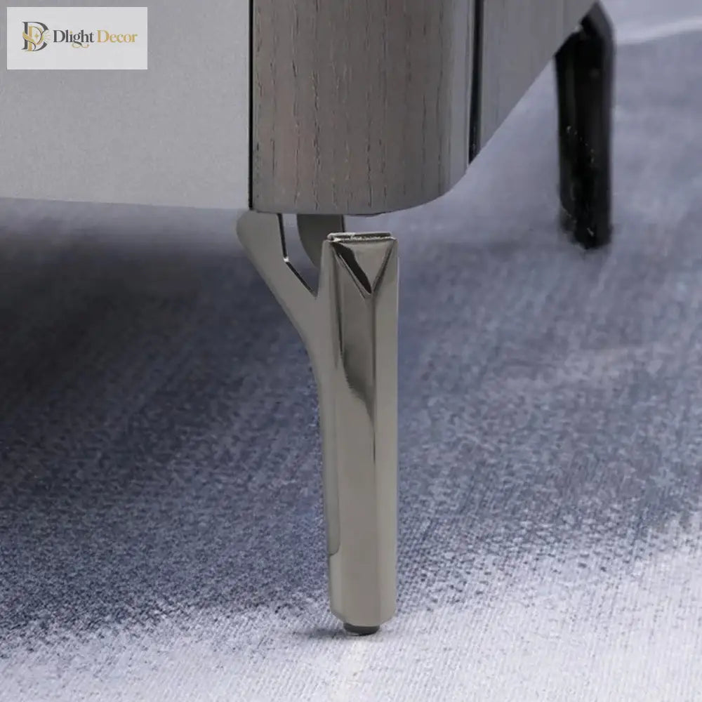 Single chrome furniture leg with angled support and base mounting