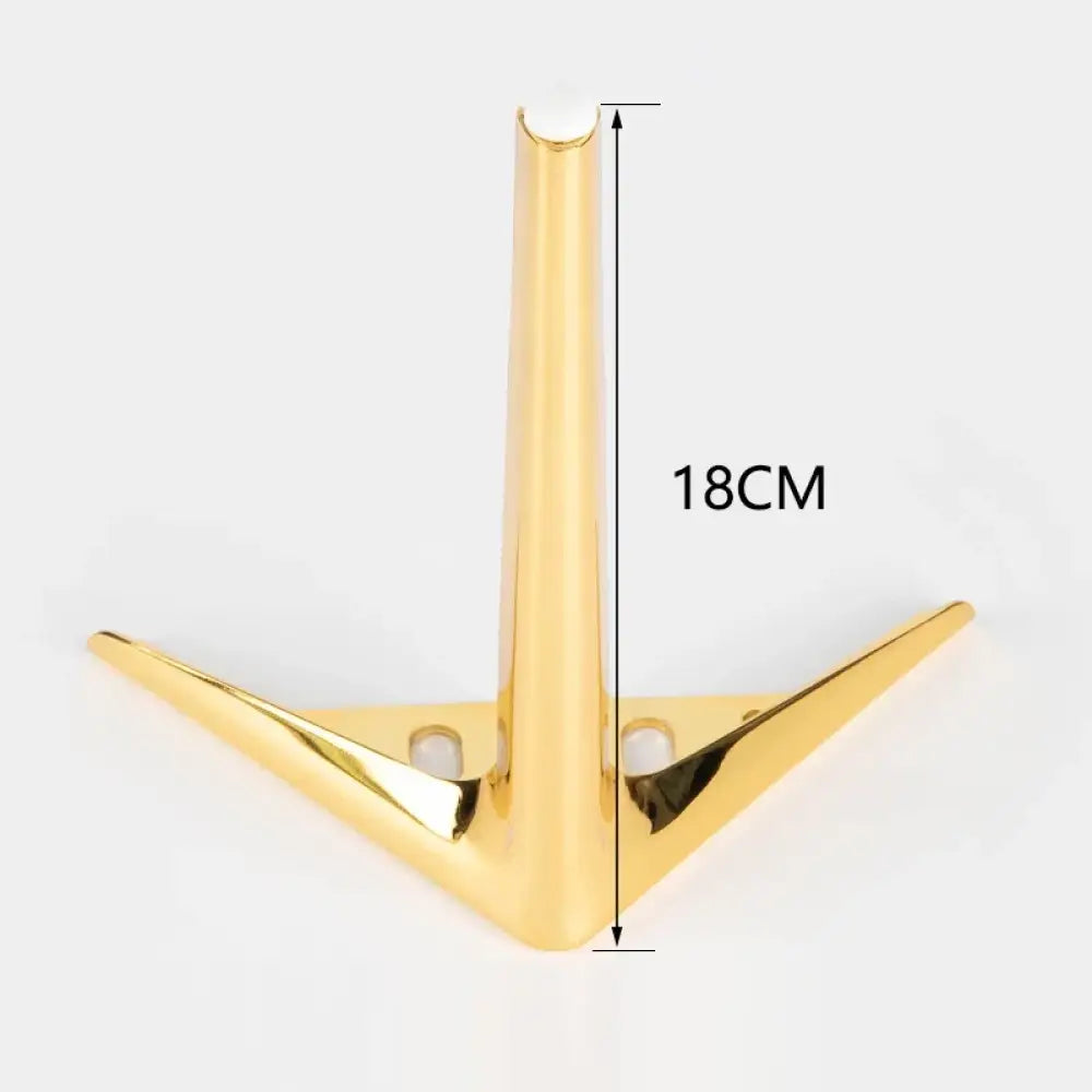 Gold metal furniture leg with three-prong base, 18cm height