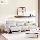 Dark metal furniture legs with slim vertical posts under sofa