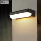 Sloane Modern Glow: Black Capsule Wall Sconce