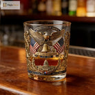 Gold-tone patriotic whiskey tumbler with eagle over shield and '250 Years of Freedom' text