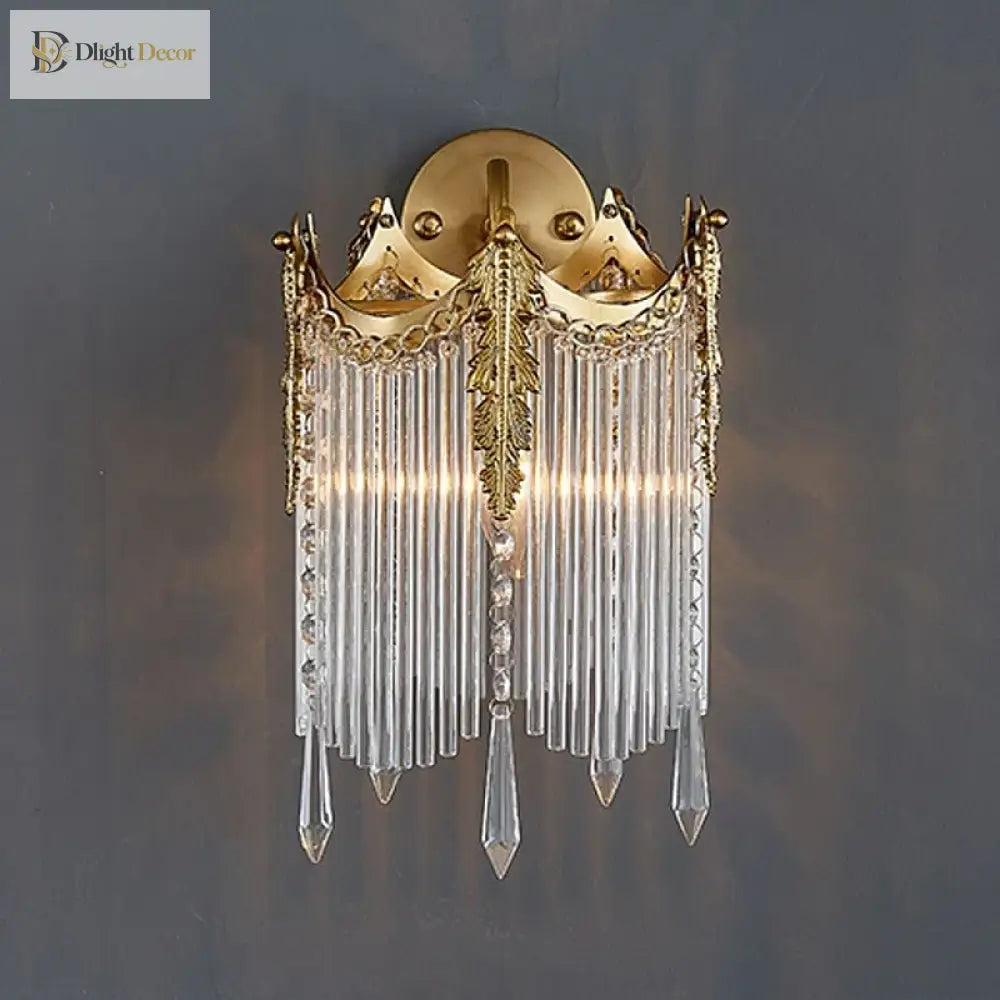 Gold crystal wall sconce with arched crown top and long crystal drops