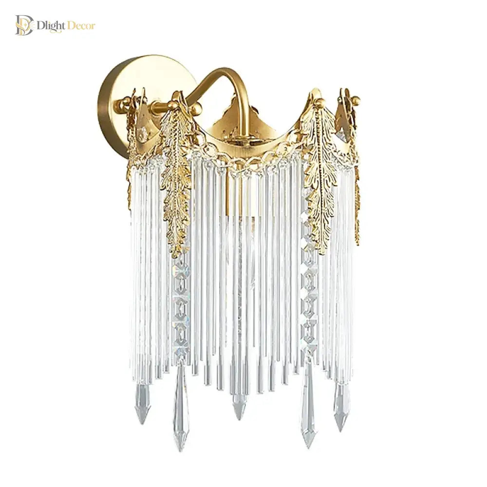 Gold crystal wall sconce with wide round backplate and fringe crystal drops