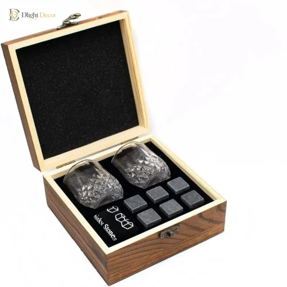 Faceted whiskey glasses and granite cube rocks in a wooden gift box
